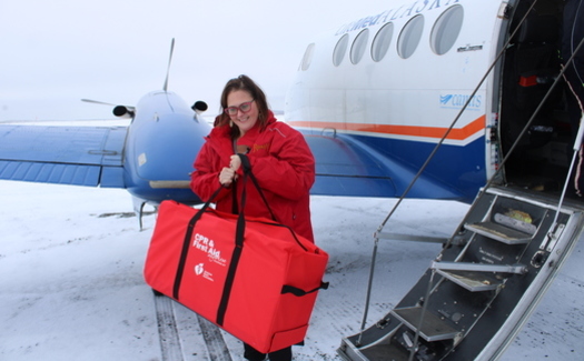 American Heart Association Alaska executive director Kristin George delivers one of hundreds of CPR and first aid kits to a remote village in rural Alaska. (AHA-Alaska)